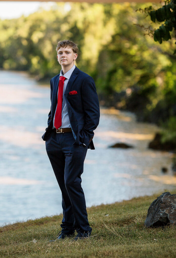 senior formal boy by River Bank Rockhampton