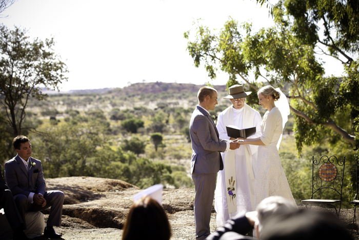 outback wedding couple with priest
