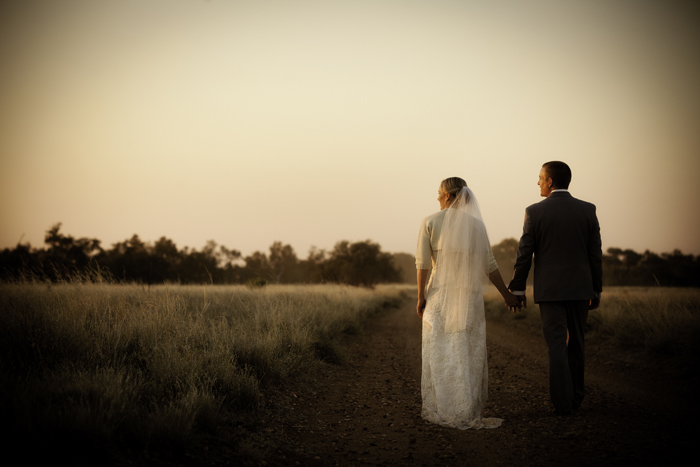 outback queensland sunset with wedding couple