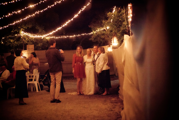wedding reception on the tennis court with fairy lights
