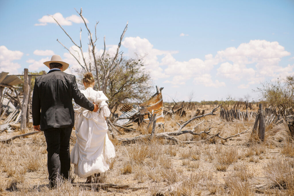bride and groom in outback rural yard setting