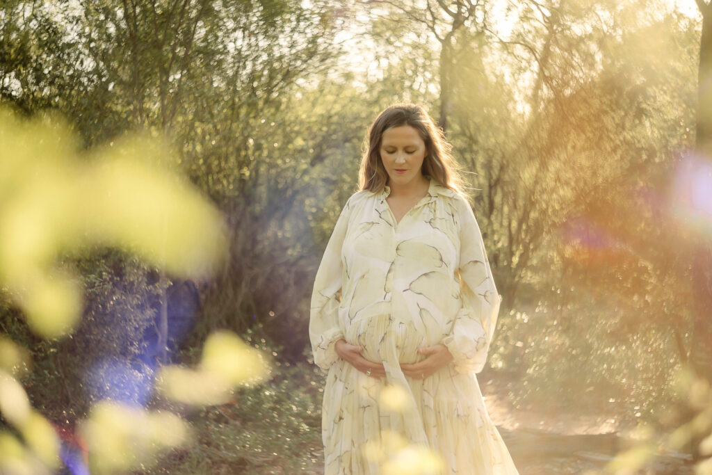 Outdoor maternity portrait using vintage lenses in afternoon light