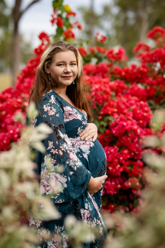 Gemma photographed among flowering bougainvillea near Comet