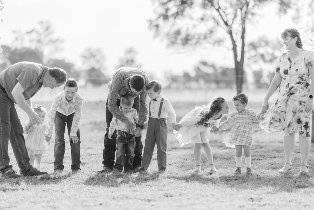 Behind-the-scenes family moment before a group portrait